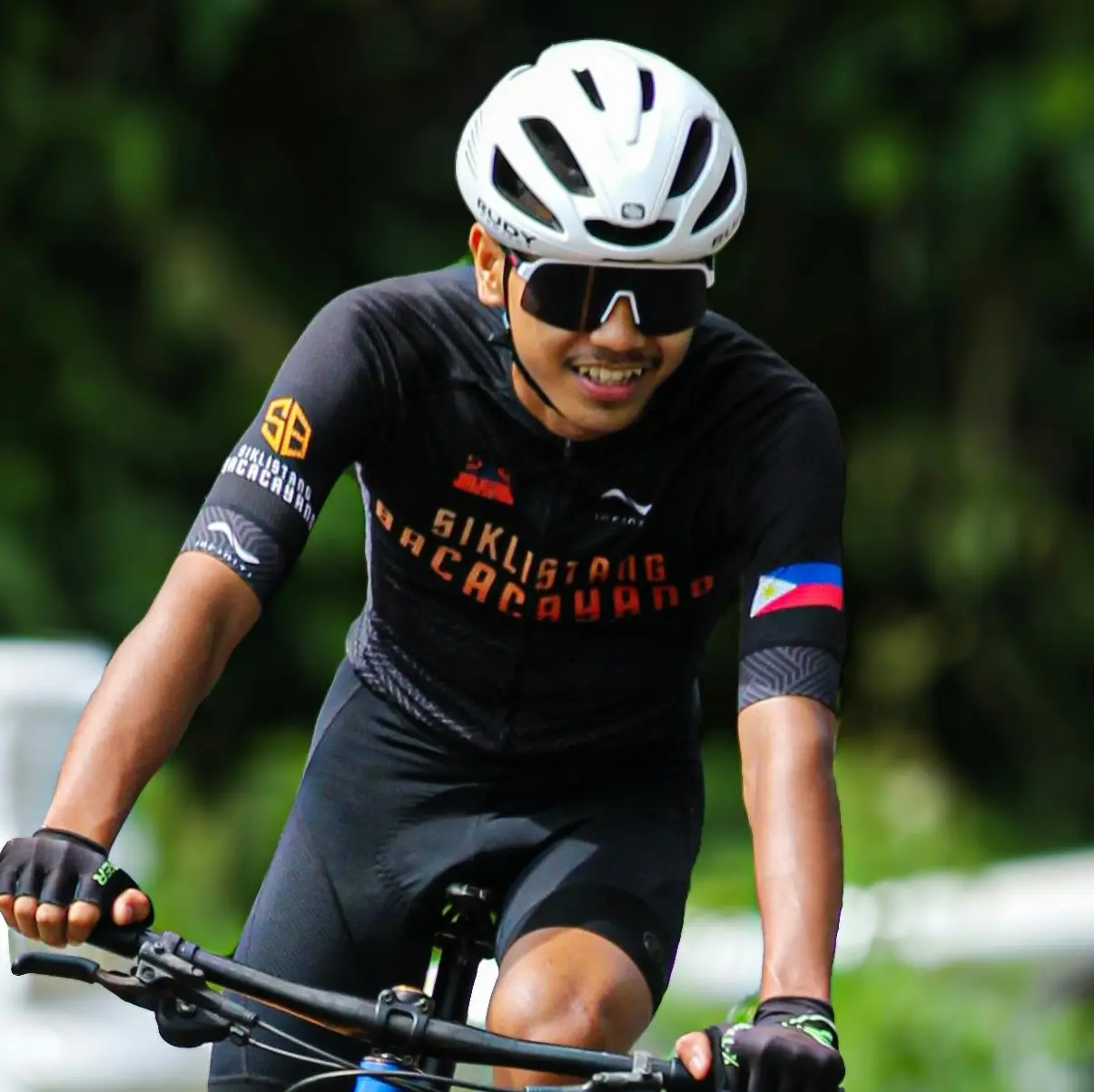 a man exercising wearing sport sunglasses